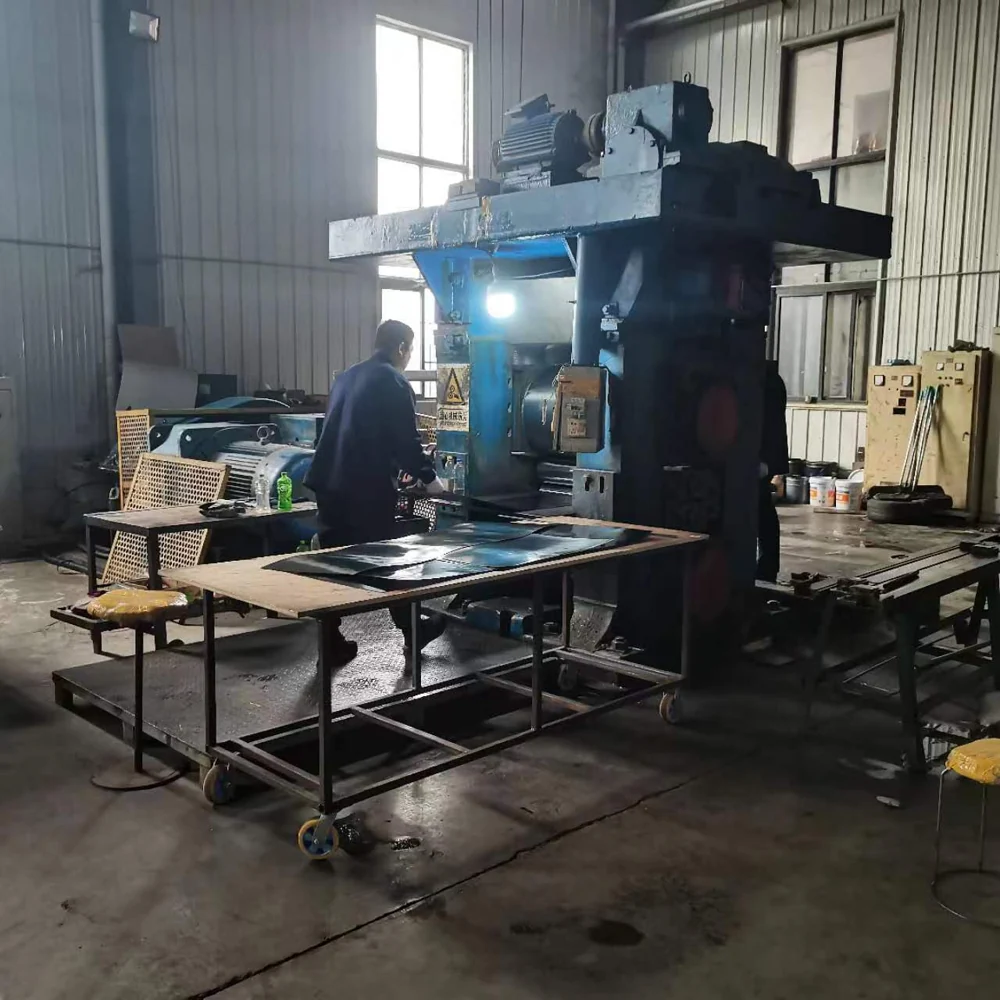 Operator working at metal forming equipment in the workshop
