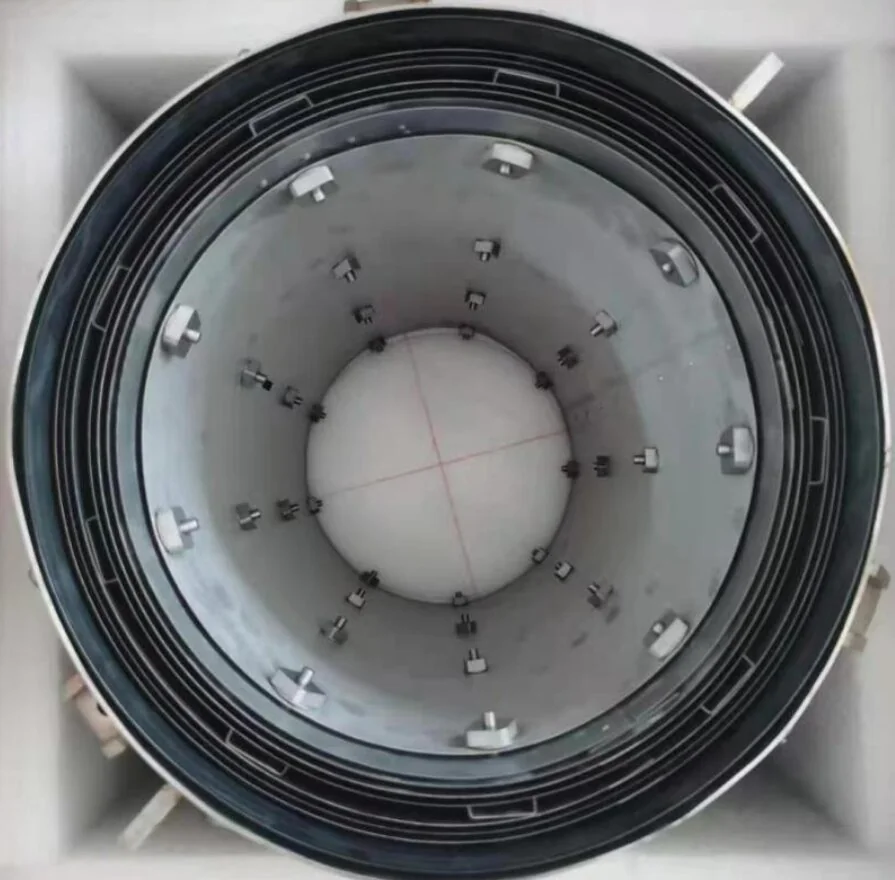 Layered metal heat-shield assembly viewed from above