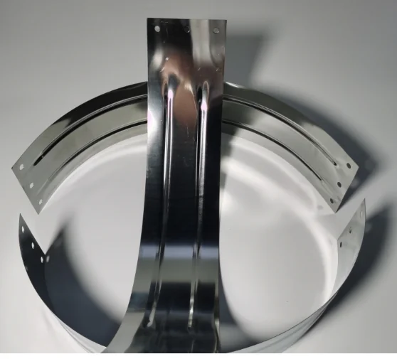 Formed metal heating band with mounting holes