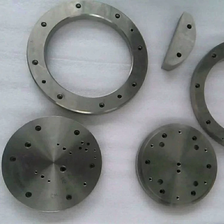 Tungsten-nickel-iron ring and circular component examples